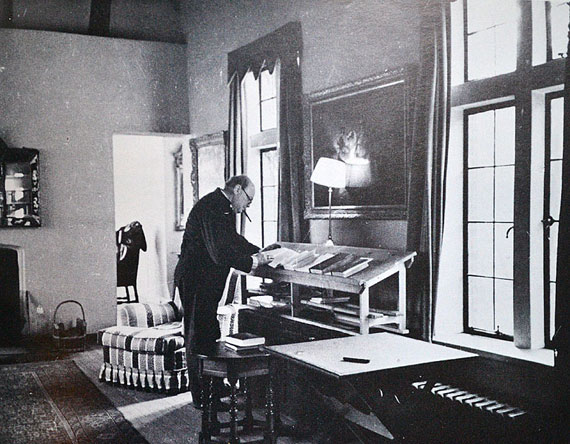 Churchill at his writing desk at Chartwell.