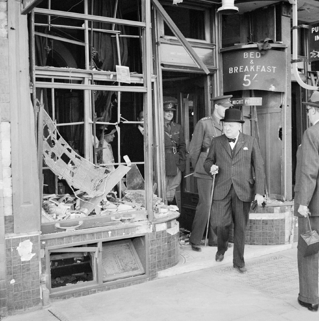 Churchill inspects air raid damage in August 1940