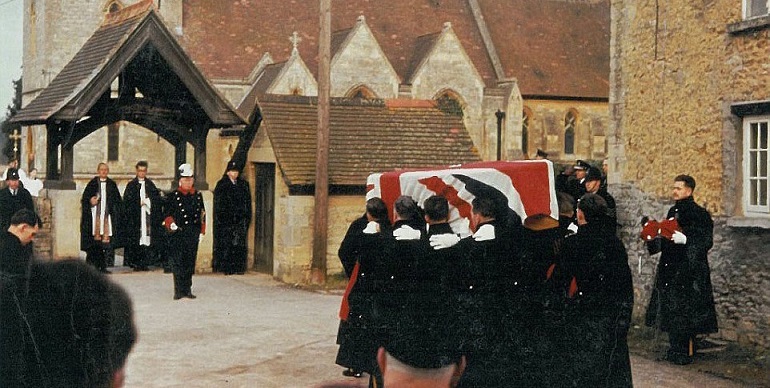 On the day of the funeral, the coffin, carried by members of the Queen’s Royal Irish Hussars, approaches the lychgate, where the public aspect of the funeral came to an end and gave way to the private family interment.